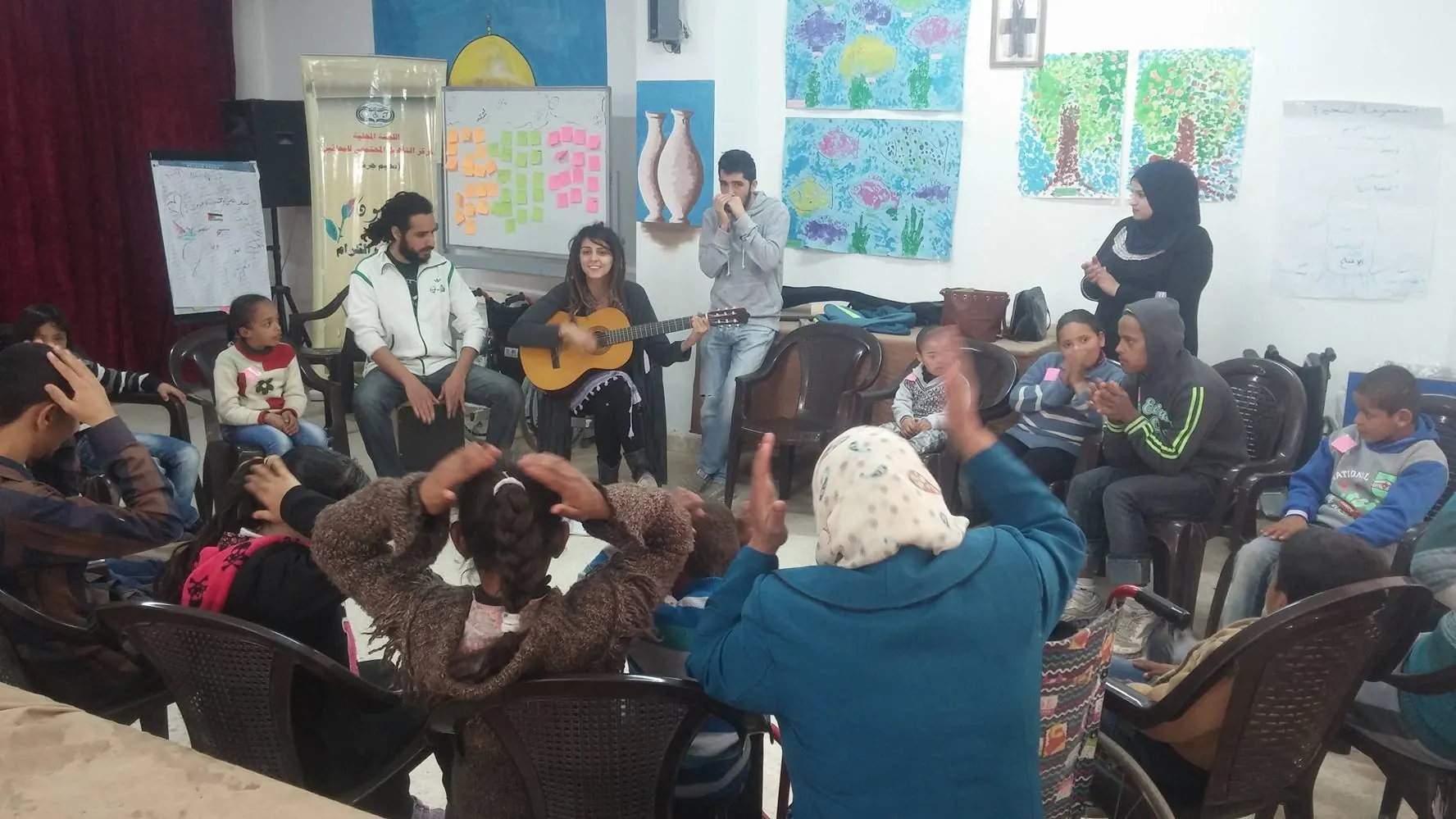 A community workshop in a painted classroom
